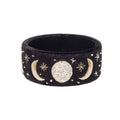 Cuenco de terciopelo negro con fases lunares