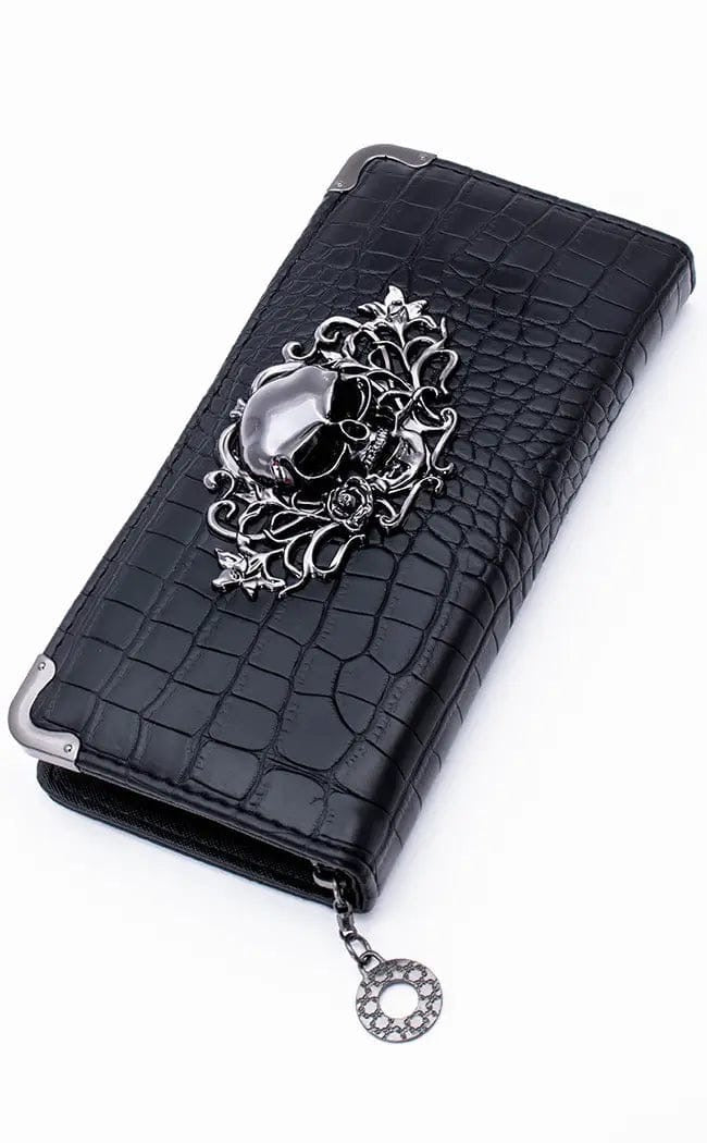 Cartera con calavera grande en relieve