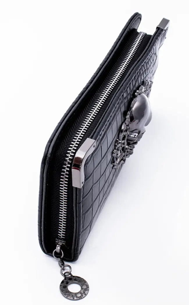 Cartera con calavera grande en relieve