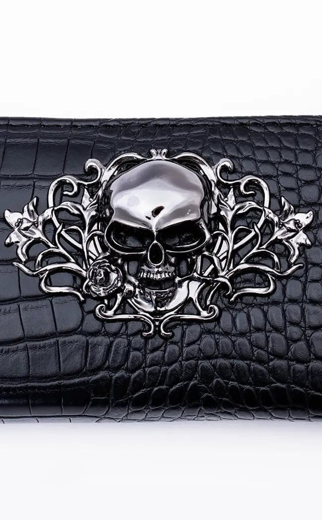 Cartera con calavera grande en relieve